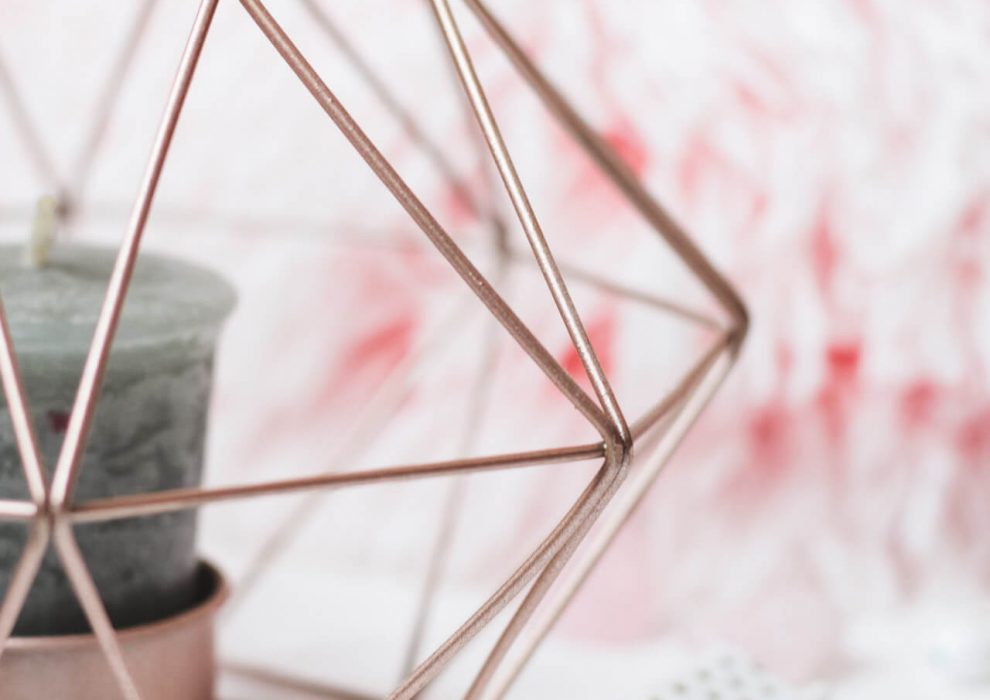 selective-focus-photography-of-candle-in-pink-ornate-holder